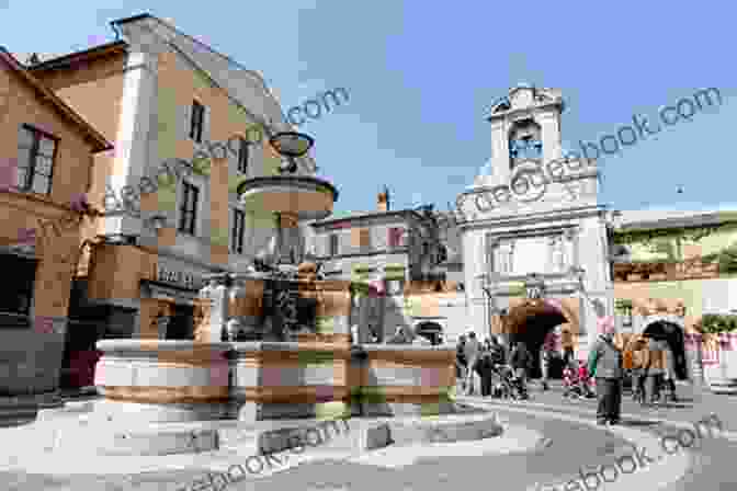 A Group Of Villagers Gather Around A Fountain In A Quaint Italian Village. Old Calabria: Travels Through Historic Rural Italy At The Turn Of The 20th Century (Illustrated)