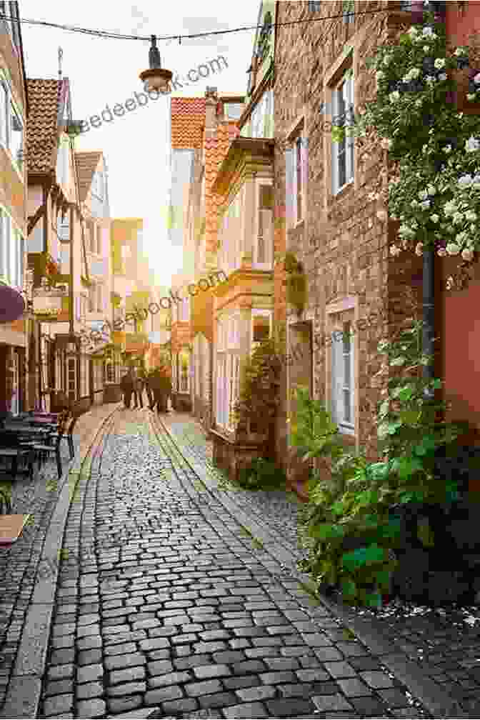 An Old English Street With Cobblestone Roads And Timber Framed Buildings. The Lure Of Old London